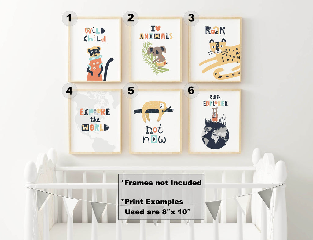 Six high-quality Wall Funk nursery prints above a white crib, featuring charming Scandinavian and boho designs with playful animals.