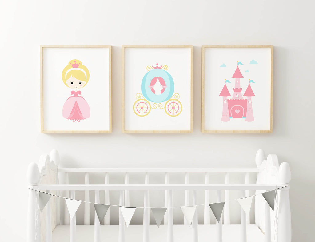 A crib with silver bunting and customized "Princess Nursery Art Prints" by Wall Funk: princess, carriage, castle. NP#36.