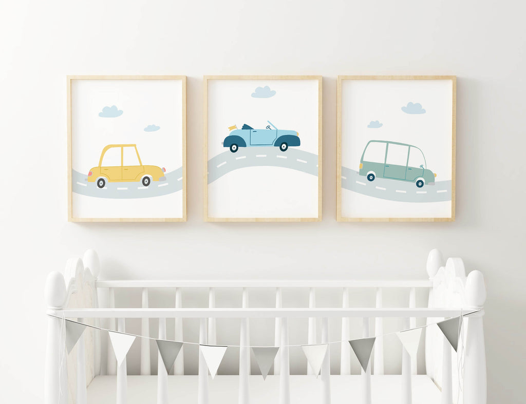 Wall Funk's Nursery Art Prints feature three pastel car illustrations above a white crib with bunting, ideal for an animal nursery.