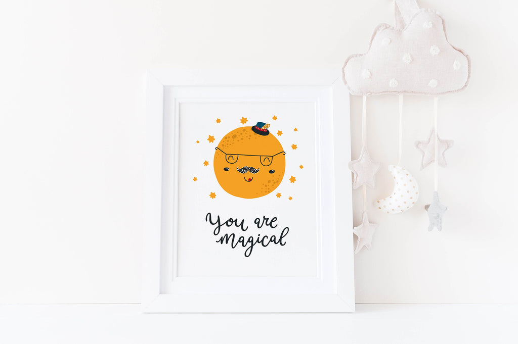 Wall Funk's Whimsical Boho Nursery Wall Art: Smiling orange circle with glasses, mustache, and hat. Reads "You are Magical".