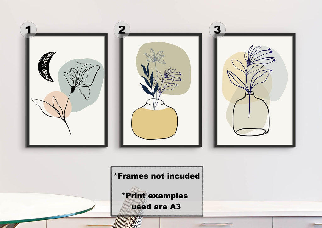 Floral Abstract Wall Art by Wall Funk: minimalist black-framed prints featuring abstract plants on neutral backgrounds, available in custom sizes.