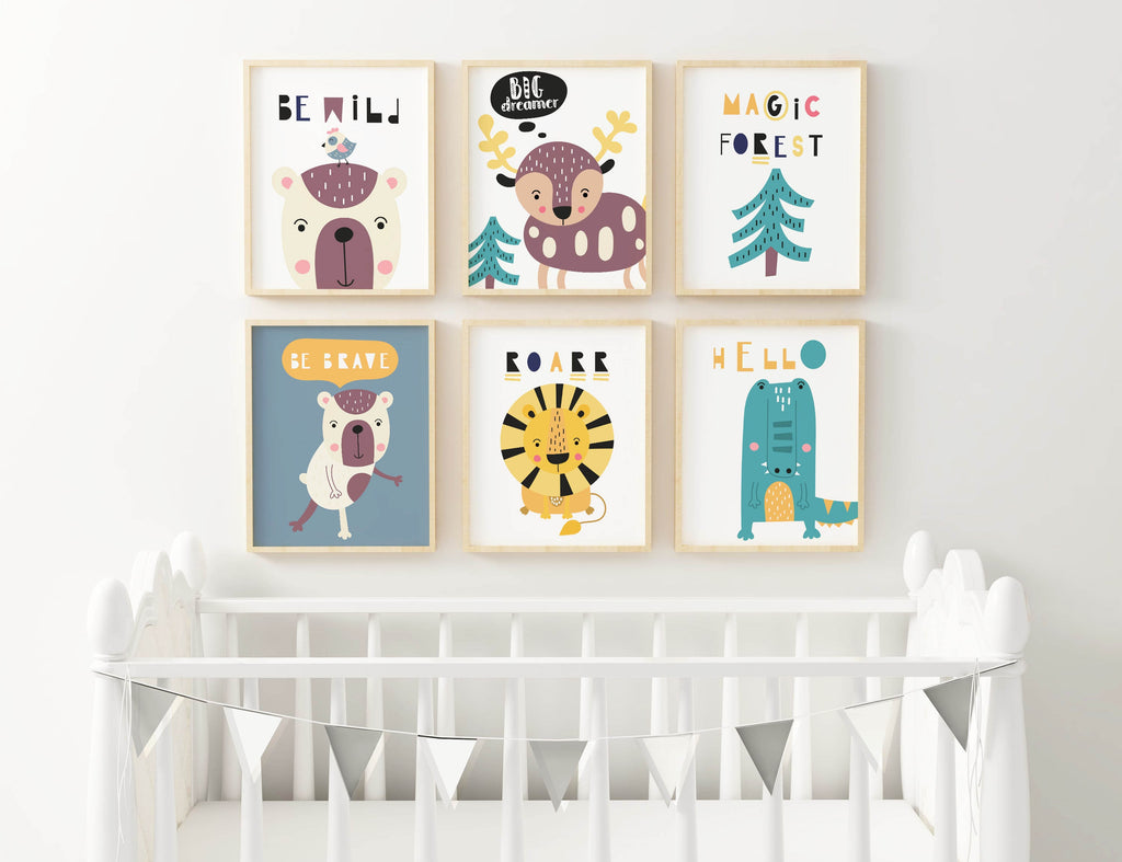 Above the white crib are six vibrant Scandinavian Style Boho Children's Art Prints from Wall Funk.