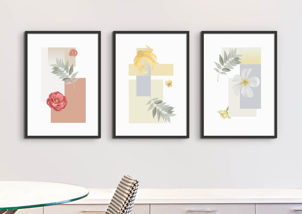 Wall Funk's Floral Abstract Wall Art features three pastel floral prints on a light wall above a table and striped chair.