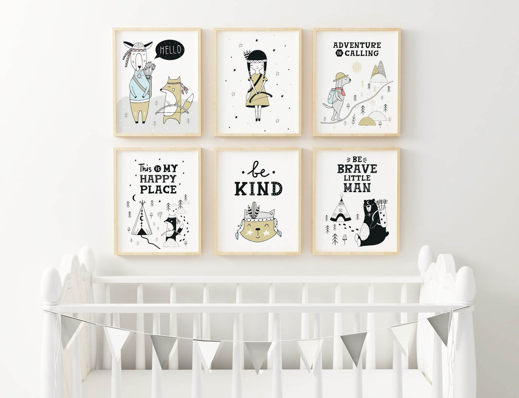 A white crib sits below a Wall Funk nursery wall featuring six charming Scandinavian animal prints and uplifting messages.