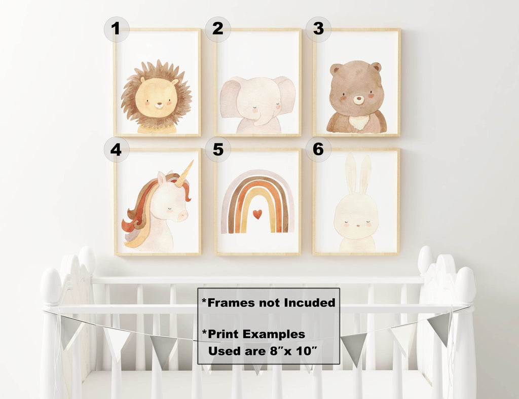 Wall Funk's Safari Nursery Prints include lion, elephant, bear, unicorn, rainbow & rabbit illustrations perfect above a white crib.