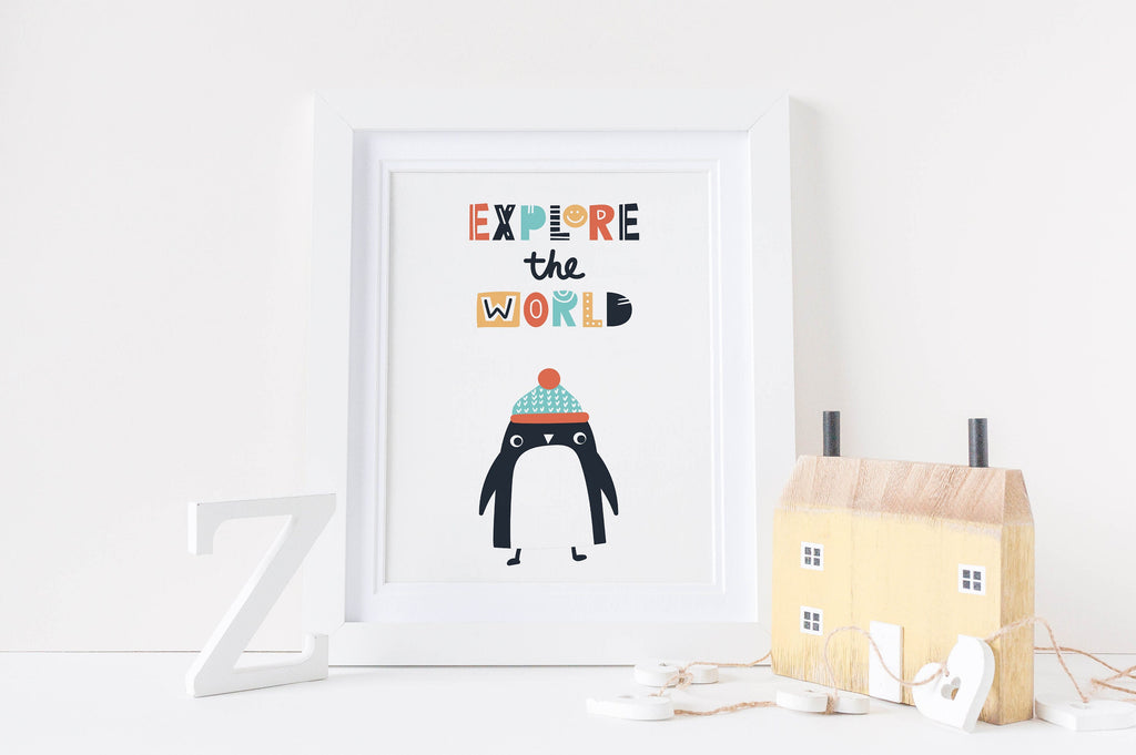 Wall Funk's Scandinavian Boho Art Print features a penguin in a hat with "Explore the World," plus a wooden house and letter "Z.