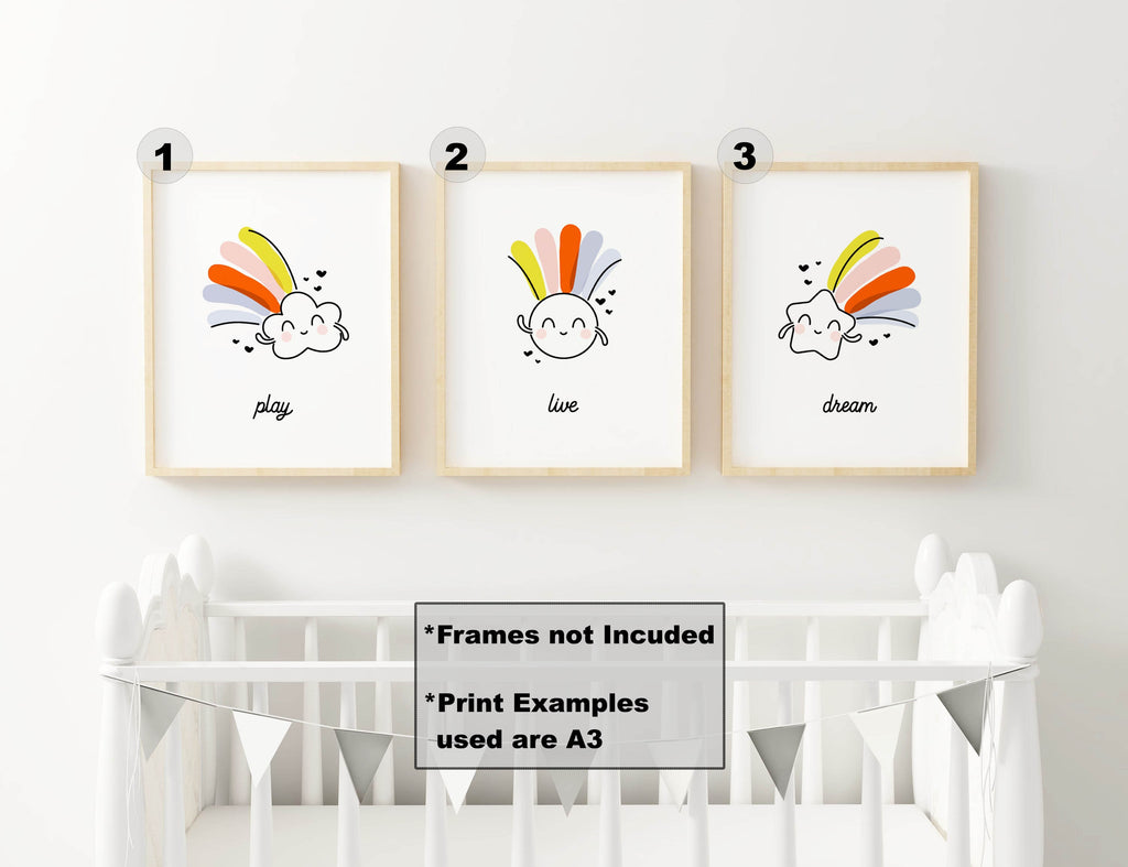 Wall Funk's NP#43 prints "play", "live", "dream" with clouds and rainbow rays above a crib. Frames not included.