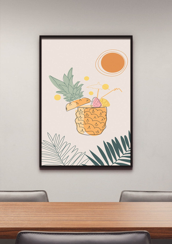 Wall Funk's "Floral Art Prints," featuring a pineapple drink adorned with leaves, a slice of dragon fruit, and a sun, hang above a wooden table with chairs. These modern wall art prints are available in custom sizes and printed on high-quality card stock to deliver vibrant colors that beautifully enhance any space.