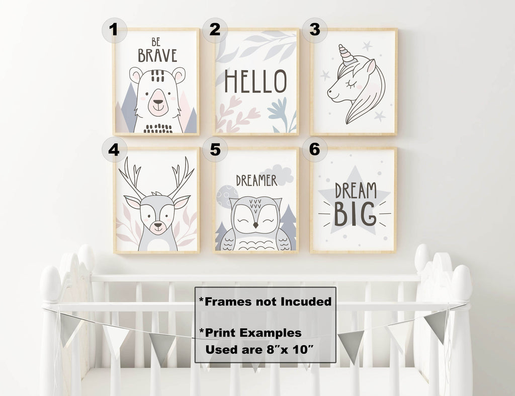 Charming Boho Nursery Art Prints by Wall Funk above a white crib, featuring animals and quotes like "Be Brave" and "Dream Big.