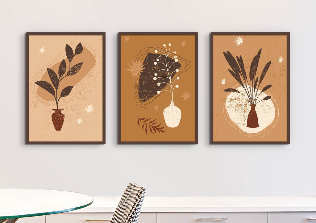 Floral Abstract Wall Art by Wall Funk: Three earthy floral prints above a dining table, available in custom sizes.