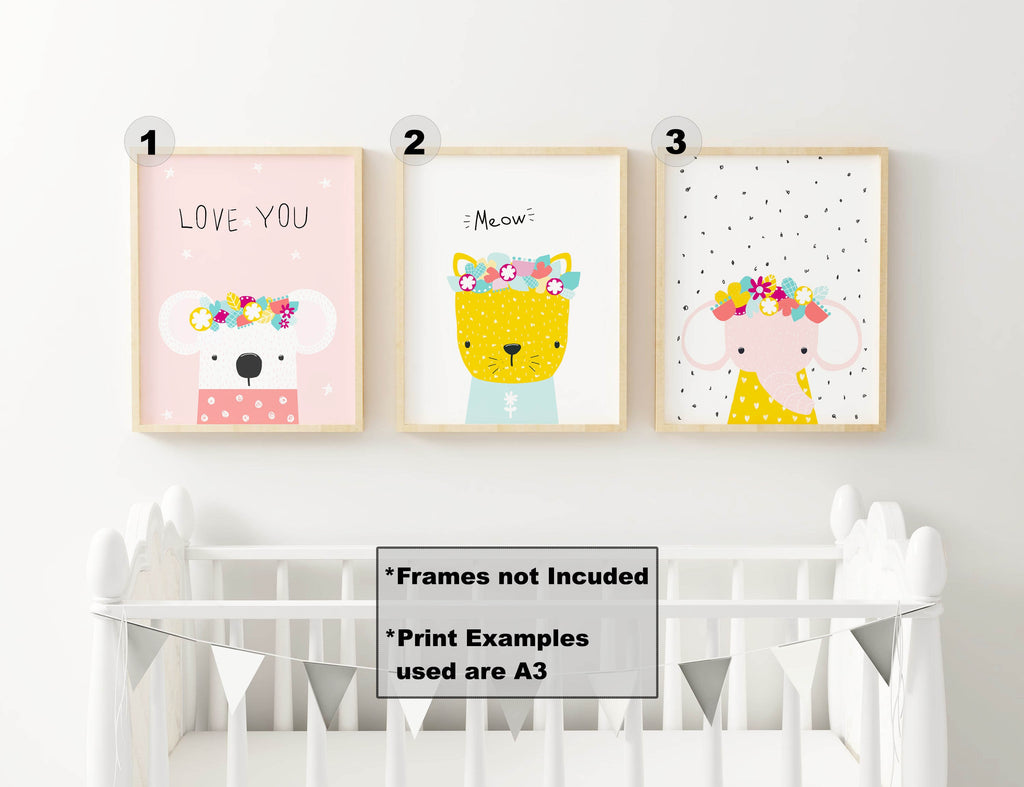 Three Wall Funk nursery art prints, NP#86, of a koala, cat & elephant with flower crowns above a crib on high-quality card in custom sizes.