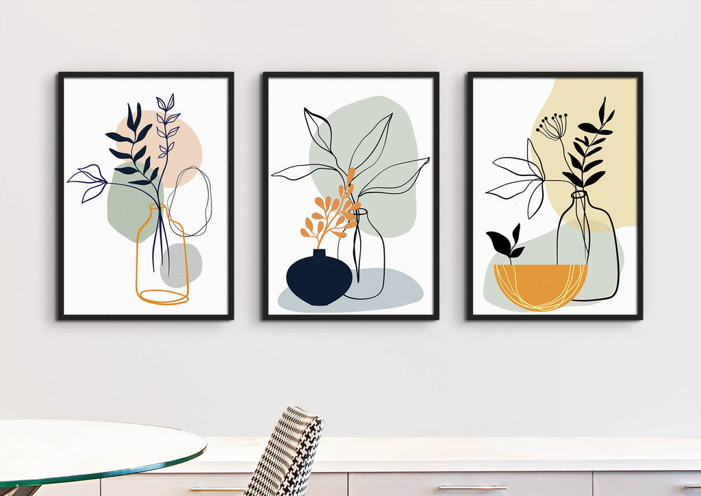 Wall Funk's Floral Art Prints grace the wall above a table, paired with a patterned chair in the foreground. FP#46.