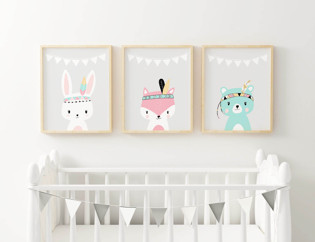 Nursery features Wall Funk's Safari Nursery Prints above a white crib, adorned with a triangular banner.