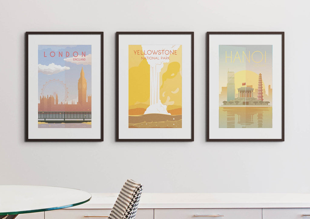 Three Wall Funk Travel Prints (London, Yellowstone, Hanoi) elegantly framed in custom sizes adorn the wall.