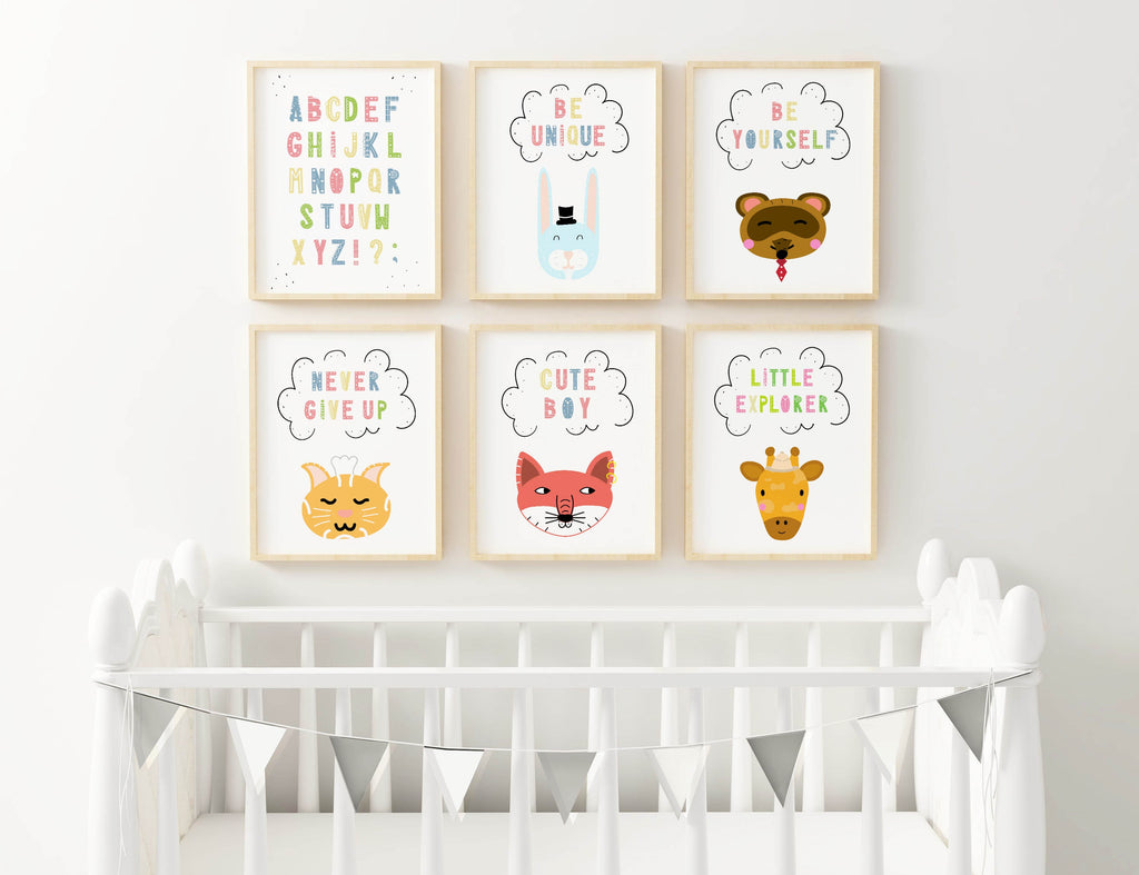 Wall Funk's set of 6 framed prints for nurseries features whimsical animals and phrases like "Be Unique" above a white and gray crib bunting.