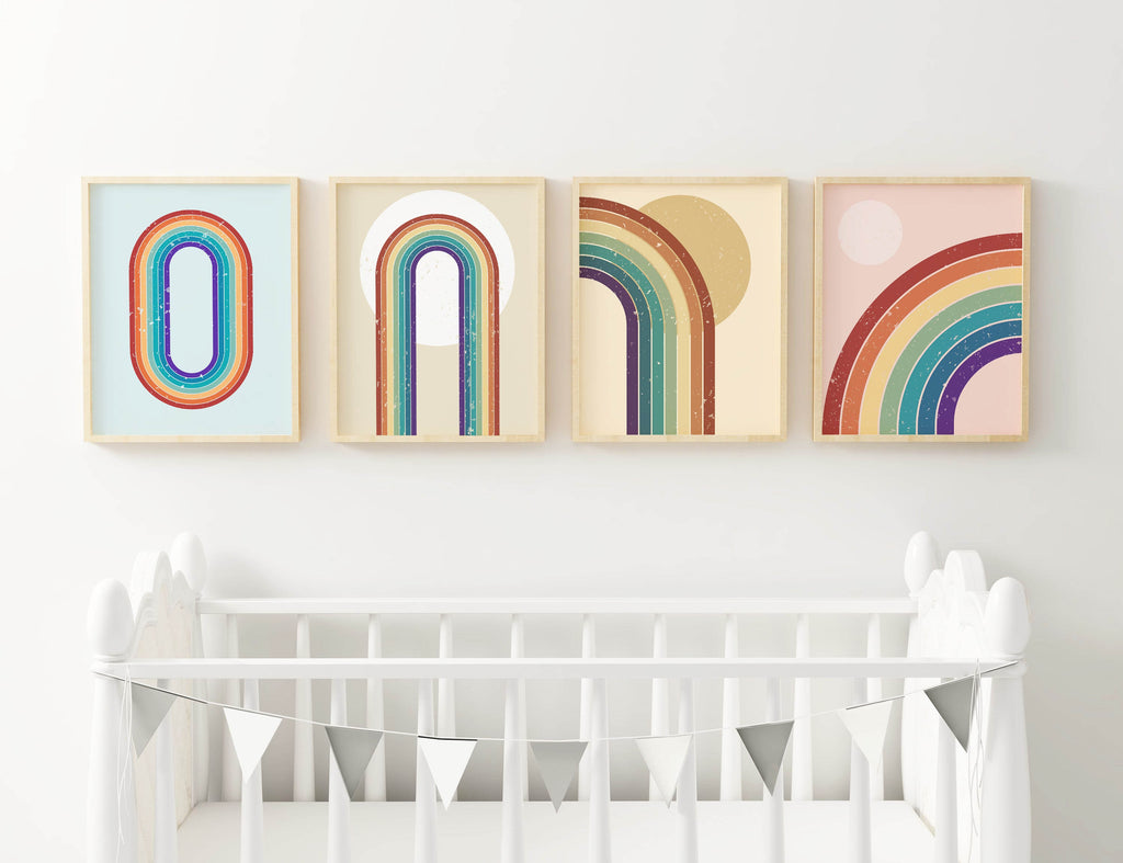 A white nursery with Wall Funk's silver bunting and four Stylish Minimalist Children's Rainbow Art Prints on the wall.