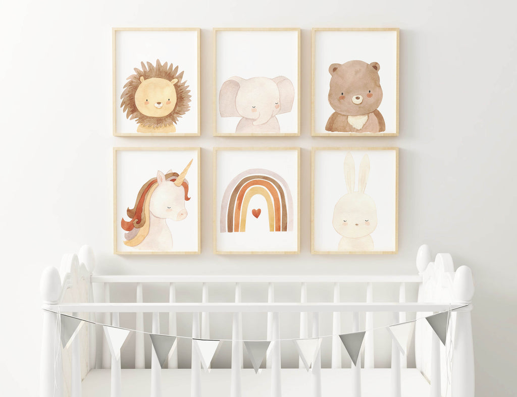 Nursery with Wall Funk's Children's Safari Boho Animals art above a white crib, adorned with a silver banner and rainbow decor.