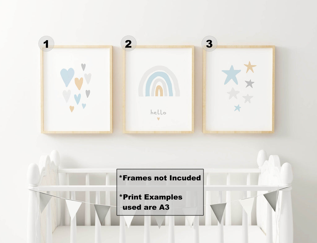 Nursery art prints with hearts, a rainbow, and stars by Wall Funk above a white crib with a banner on high-quality card. NP#39.