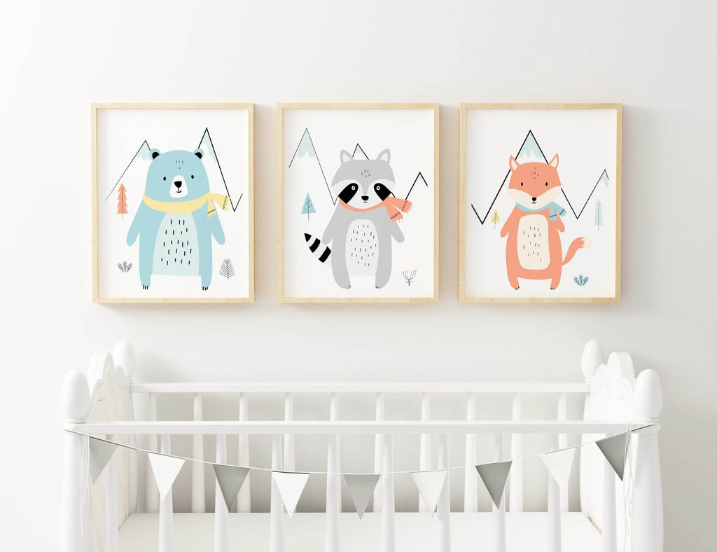 Wall Funk's Charming Animal Prints: Bear, Raccoon, Fox in Soft Pastels above white crib with mountain backgrounds and triangle details.