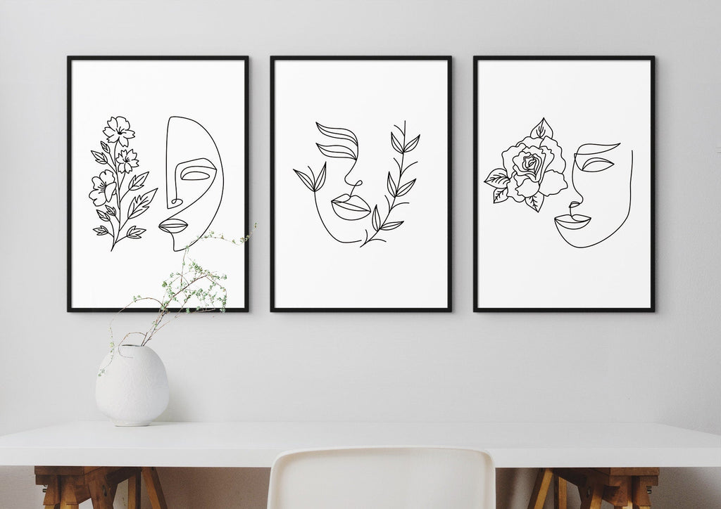 Wall Funk's Floral Abstract Wall Art in black frames adorns a white wall, complemented by a table with a white vase.