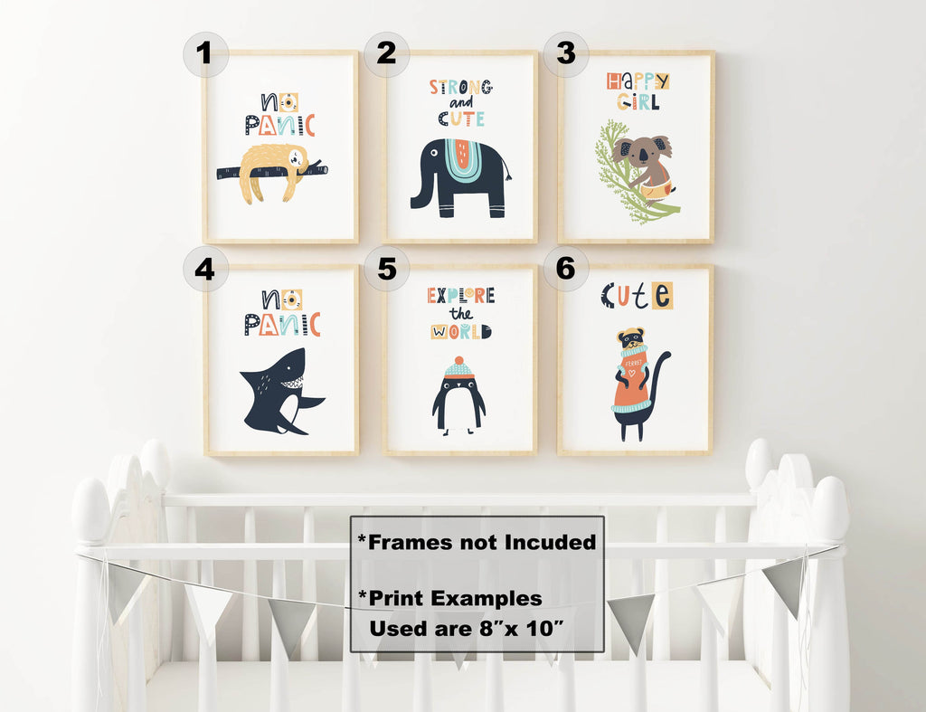 Six Wall Funk Scandinavian Boho Style Children's Art Prints above a white crib with decorative bunting.