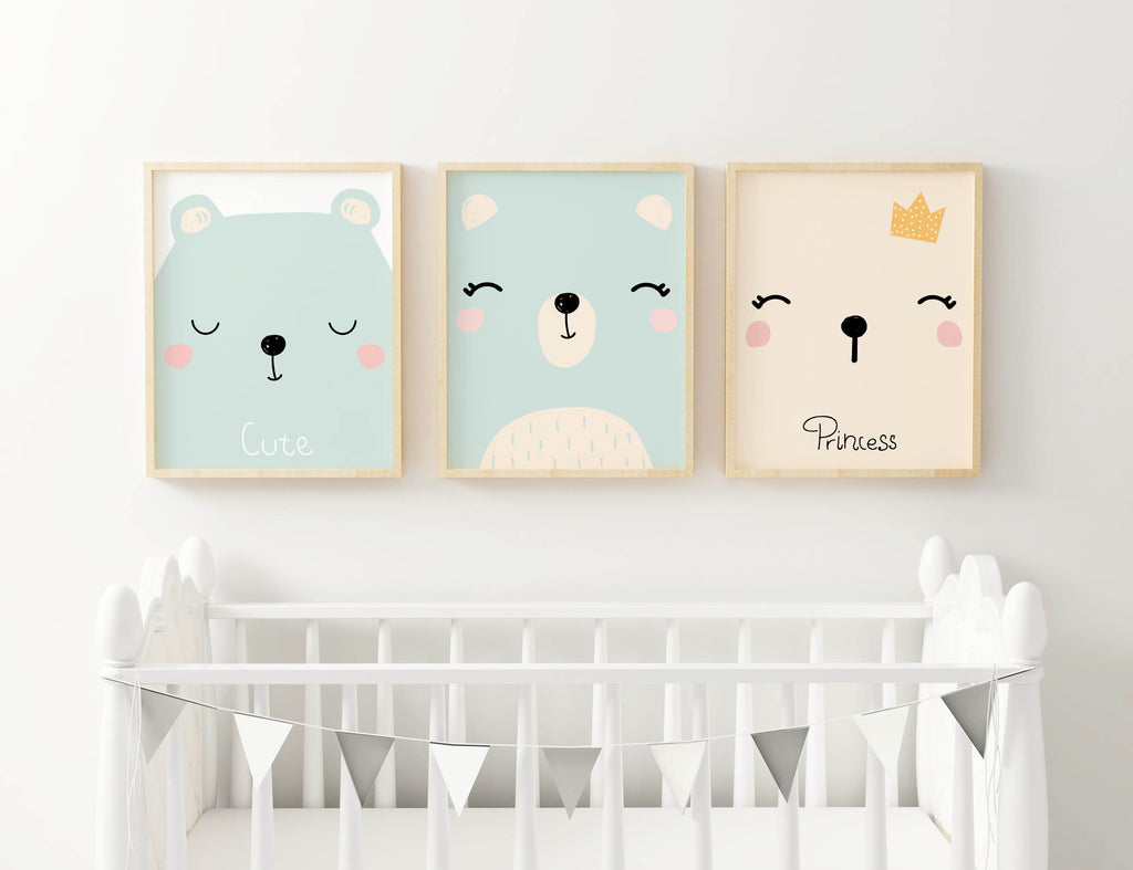 Three Wall Funk prints above a white crib, featuring pastel bears with "Cute" and "Princess." Perfect for a cozy, playful nursery.