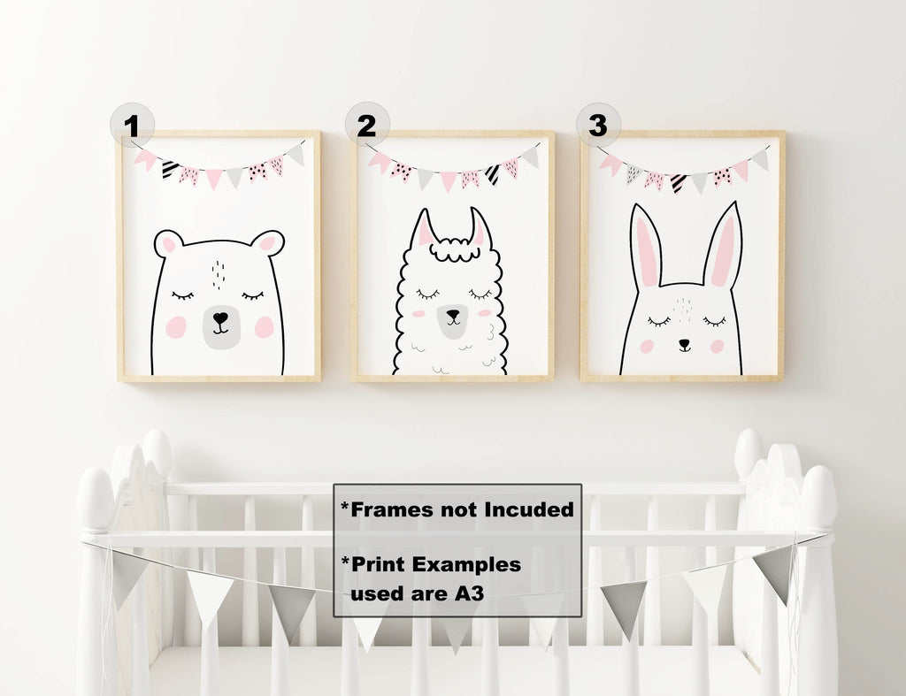 Three Wall Funk safari animal prints (bear, llama, rabbit) above a white crib with bunting. Frames not included.