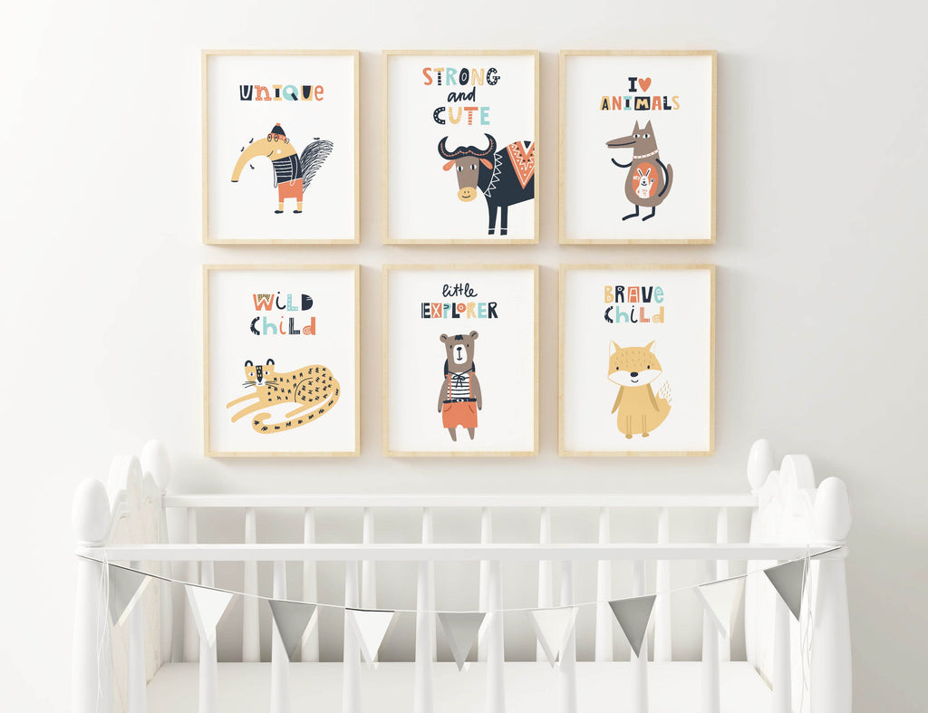 Six Wall Funk nursery prints frame above a crib, featuring animals on high-quality card.