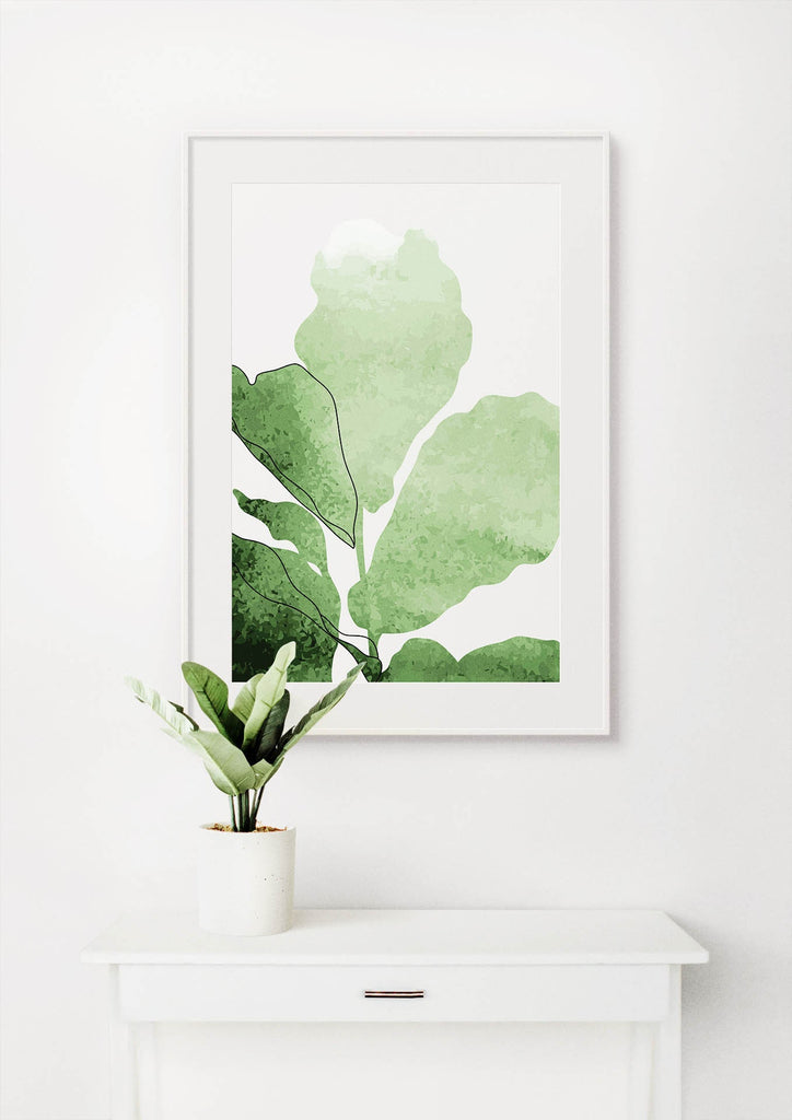 Floral Abstract Wall Art by Wall Funk: Green plant illustration, white frame, card print, small potted plant on table included.