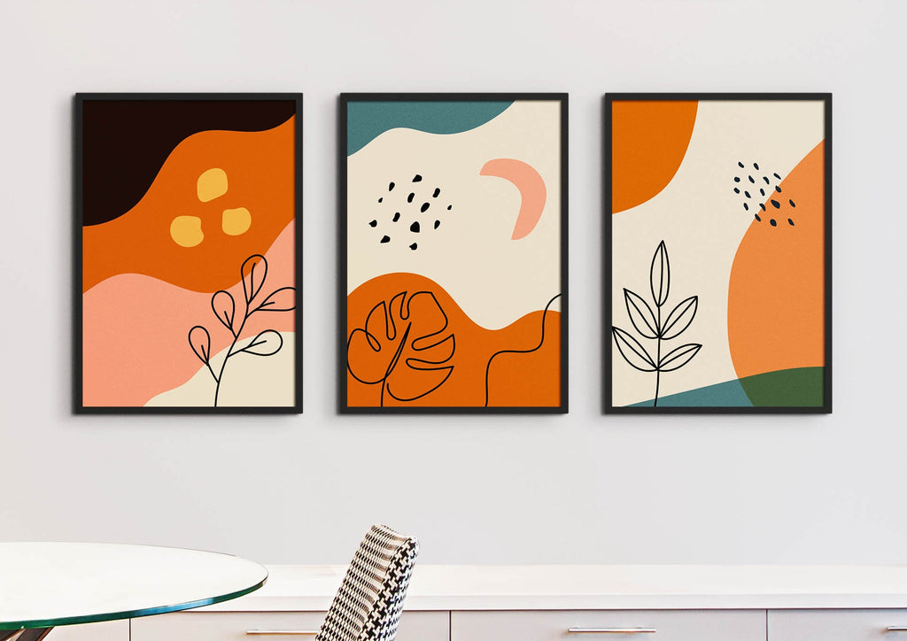 Wall Funk's Floral Abstract Wall Art with orange, pink, and green shapes adorns a white wall above a table in custom sizes.