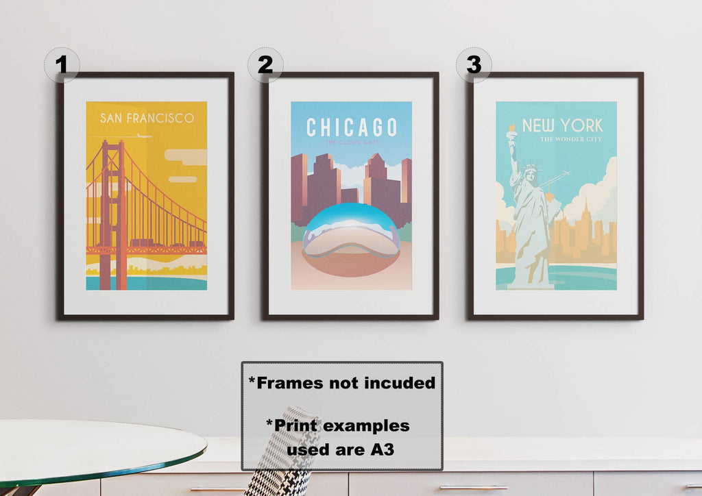 Three framed Wall Funk prints: Golden Gate, Cloud Gate, and Statue of Liberty on high-quality card.