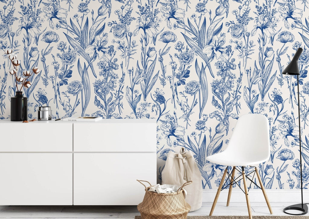 a blue and white floral wallpaper in a room