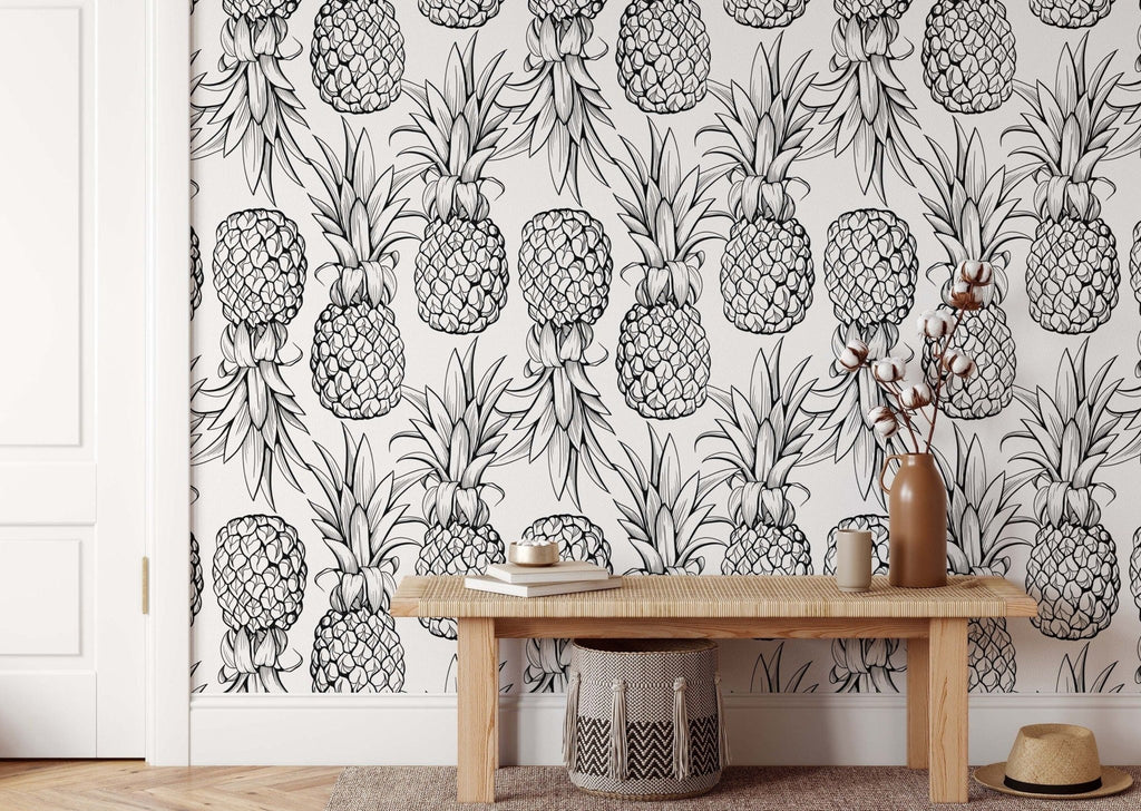 a pineapple wallpaper with black and white pineapples
